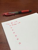 to do list on paper with red ink