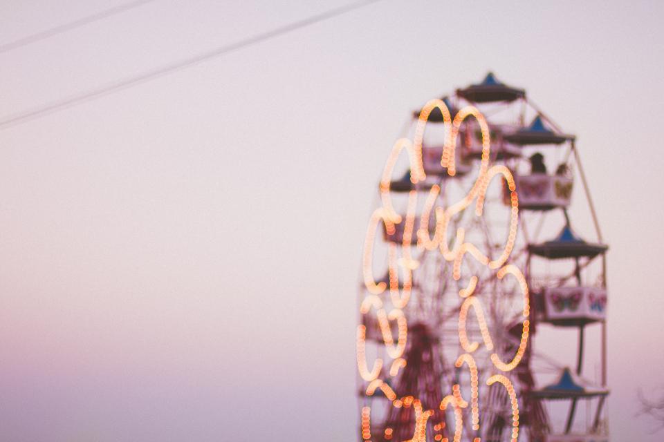 image of ferris wheel with people riding